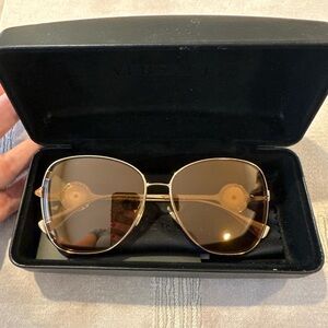 Versace Women's Sunglasses in Gold